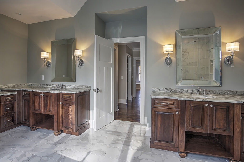 A picture of split his and hers master bathroom vanities that we designed and installed